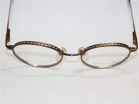 montatura di occhiali di christian dior oro prezzi